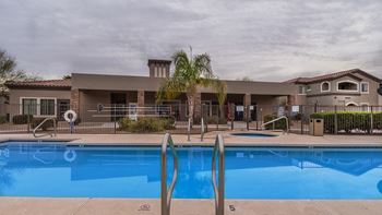 Desert Sands sparkling rectangular pool in the center of the apartment complex. 
